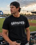 Black Never Satisfied T-shirt shown at a baseball stadium